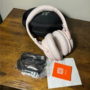 Wireless headphones in pink. Brand new
